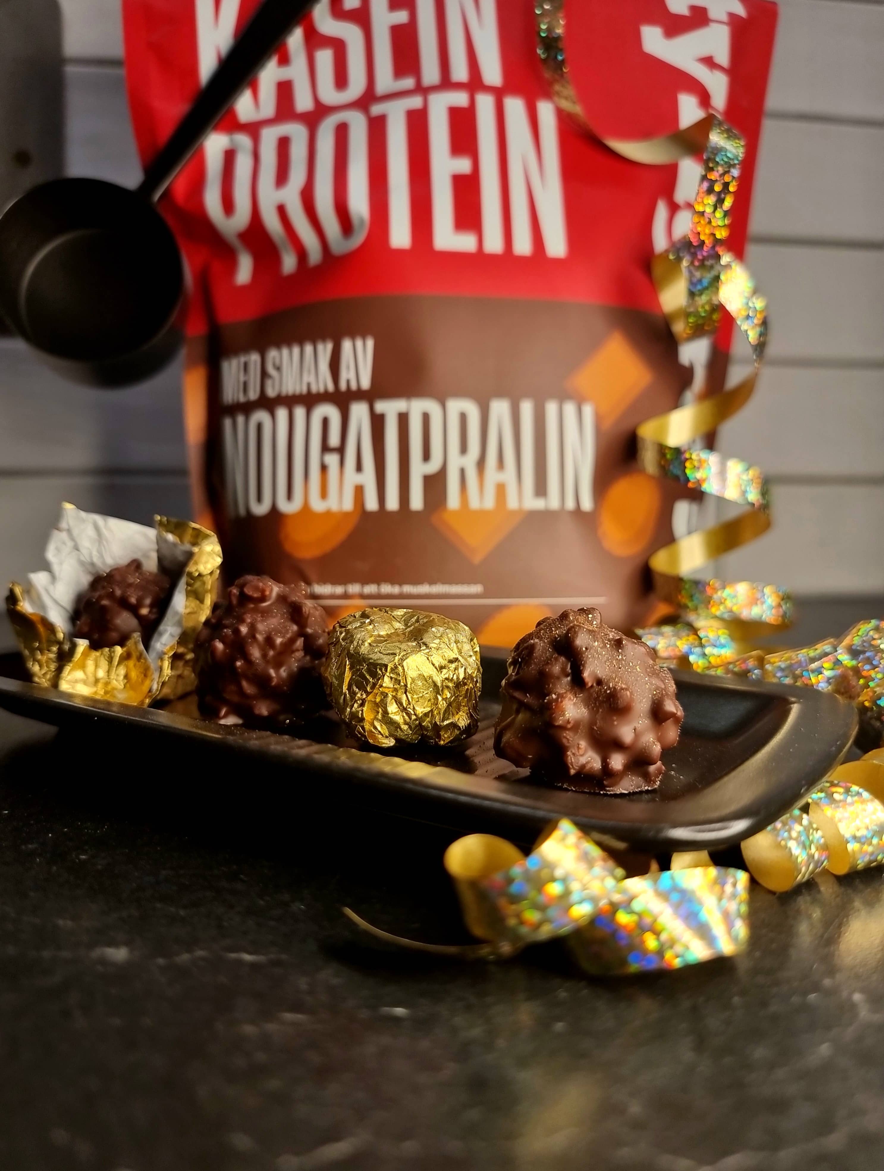 Lyxiga och proteinrika hasselnötspraliner kasein nougatpralin